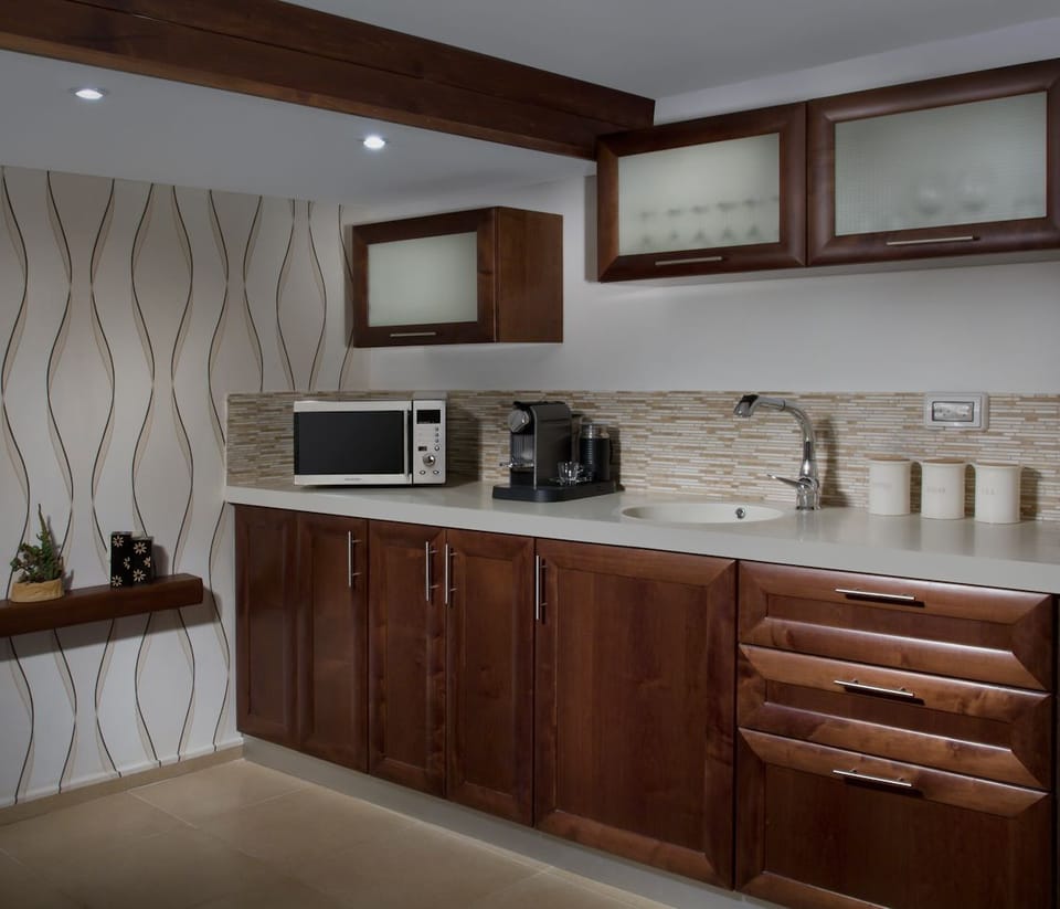 Deluxe Suite, 1 Queen Bed with Sofa bed, Non Smoking | Private kitchen | Fridge, microwave, dishwasher, coffee/tea maker