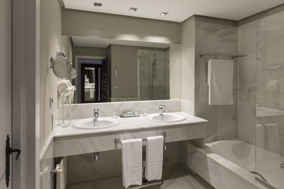 Eco-friendly toiletries, hair dryer, bidet, towels