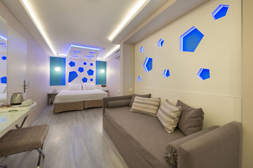 Triple Room | Living area | 20-inch LED TV with satellite channels, TV