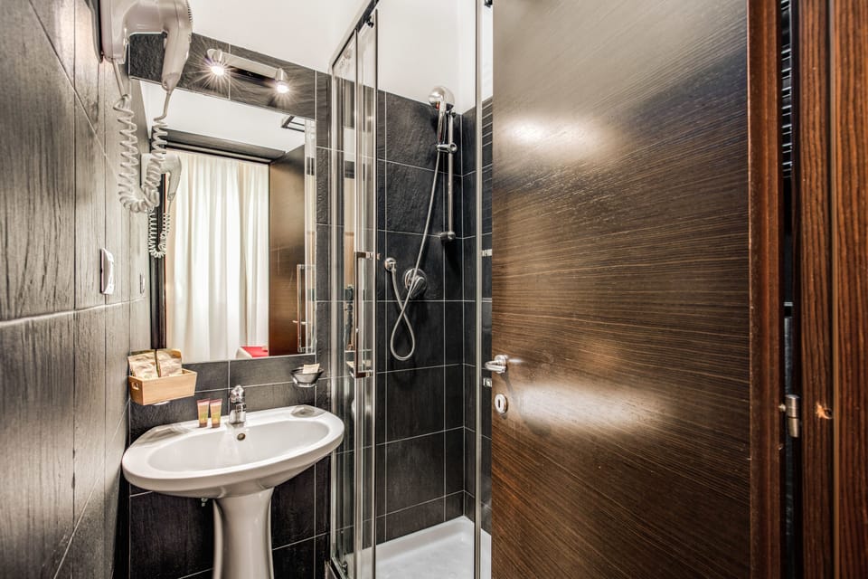 Double or Twin Room | Bathroom | Shower, free toiletries, hair dryer, slippers