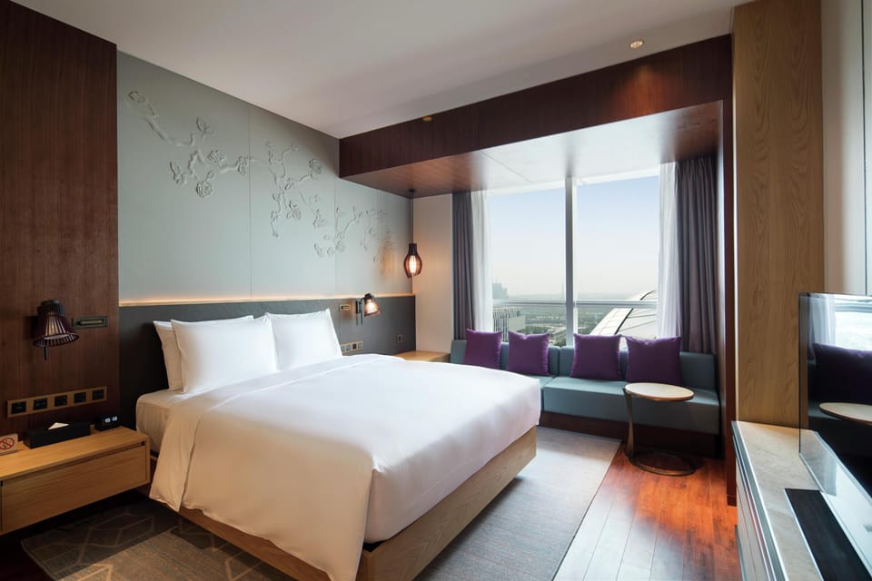 King One Bed room Deluxe Suite | Minibar, in-room safe, desk, laptop workspace