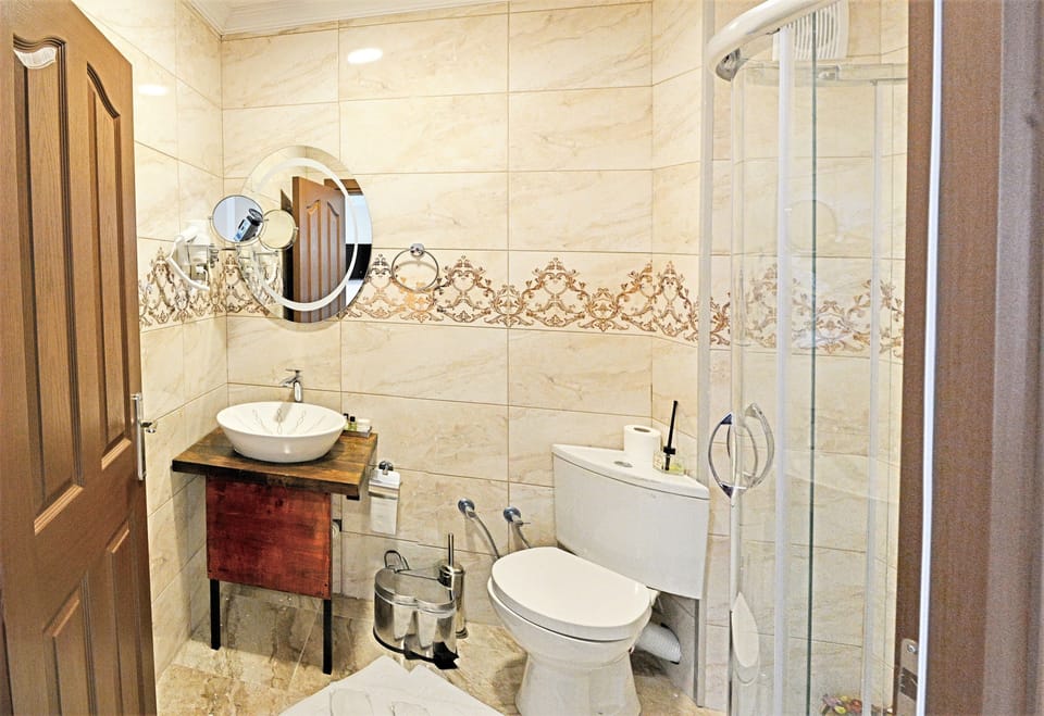 Family Quadruple Room, Garden View | Bathroom | Shower, free toiletries, hair dryer, slippers