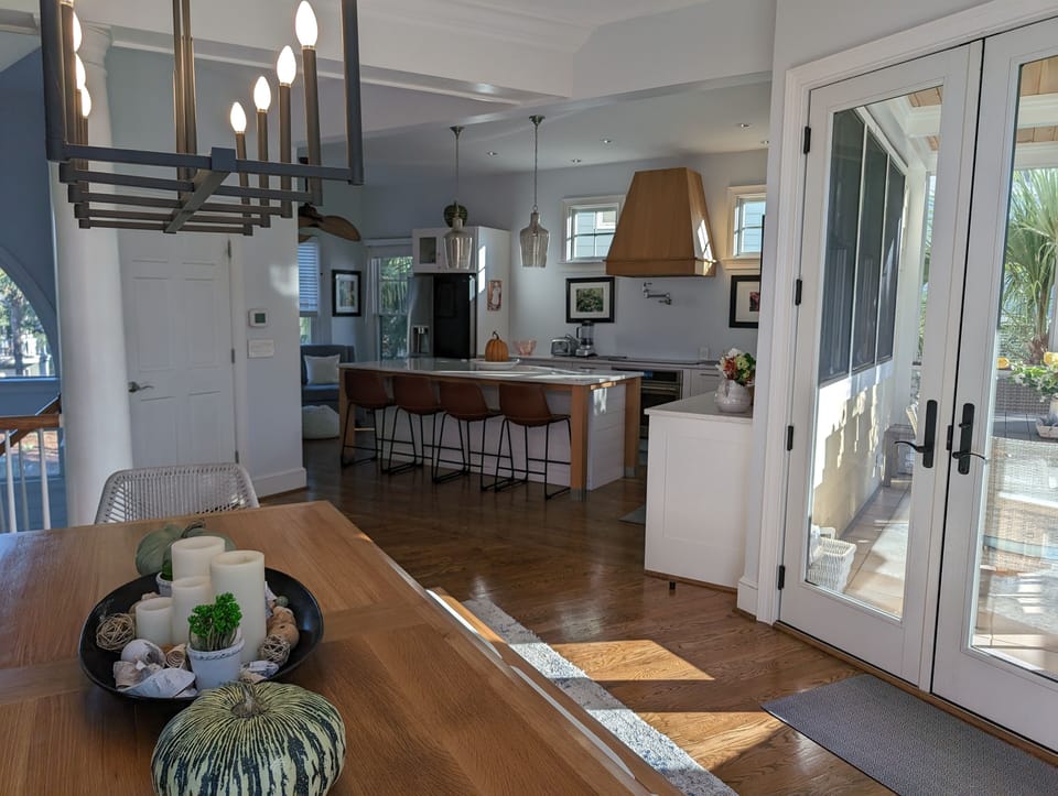 Updated open kitchen concept- access to dining & family room & screened porch