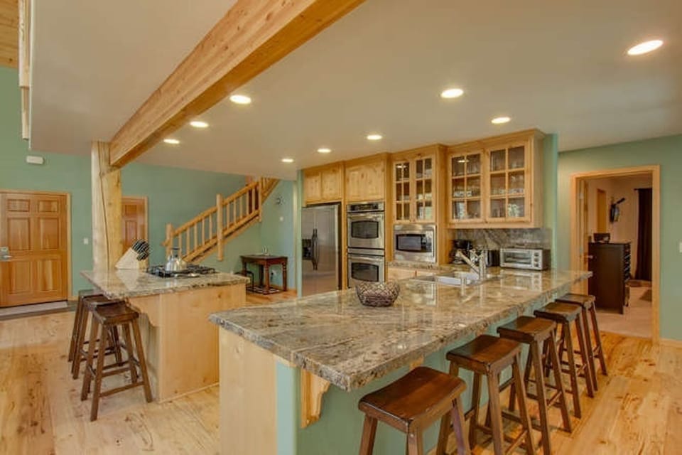 Kitchen with 2 islands with seating of 8 people