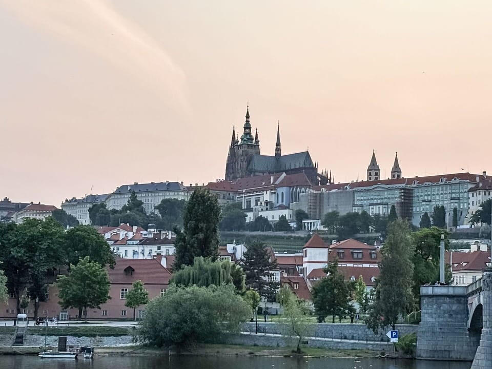 Sky, Building, City, Urban Area, Roof, Architecture, Waterway, Town, Spire, Landmark