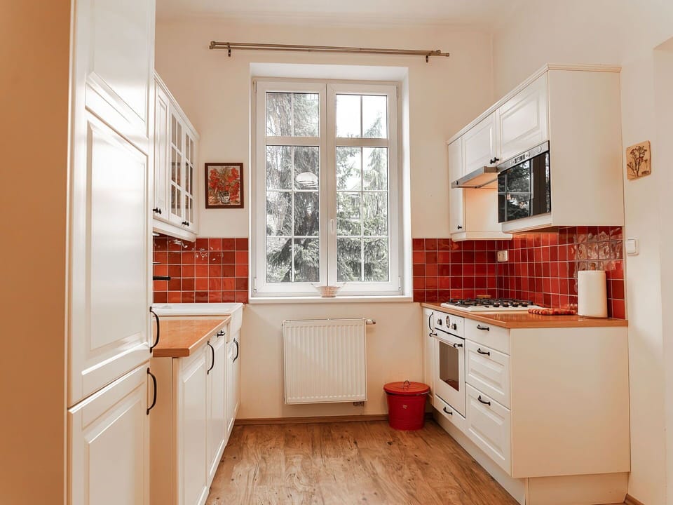 Cabinetry, Property, Window, Countertop, Wood, Kitchen, Interior Design, Drawer, Flooring, Floor