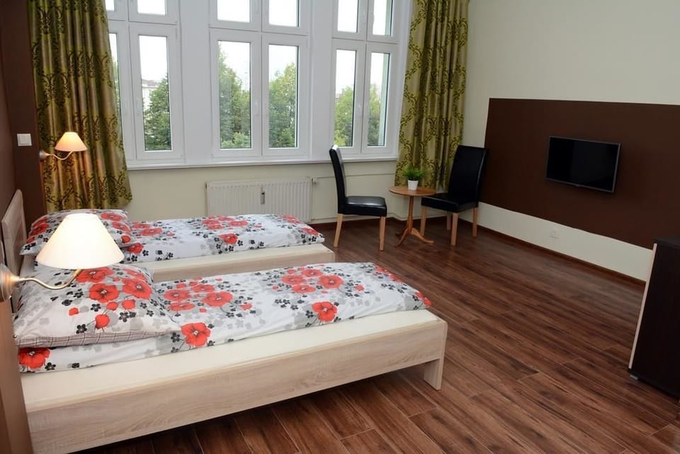 Basic Quadruple Room, 1 Bedroom | 1 bedroom, blackout drapes, soundproofing, iron/ironing board