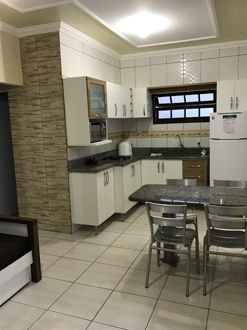 Family Apartment, Multiple Beds, Non Smoking | Private kitchen | Full-size fridge, microwave, oven, stovetop