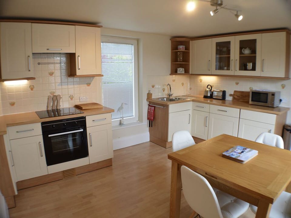The fully fitted kitchen with amazing views