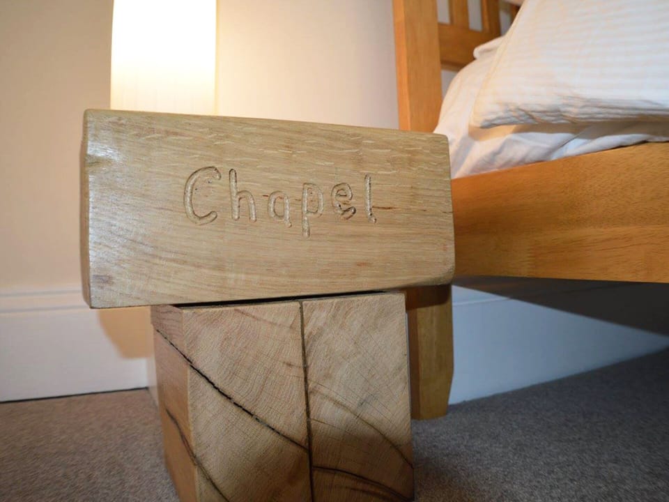 The custom made bedside tables in the king room