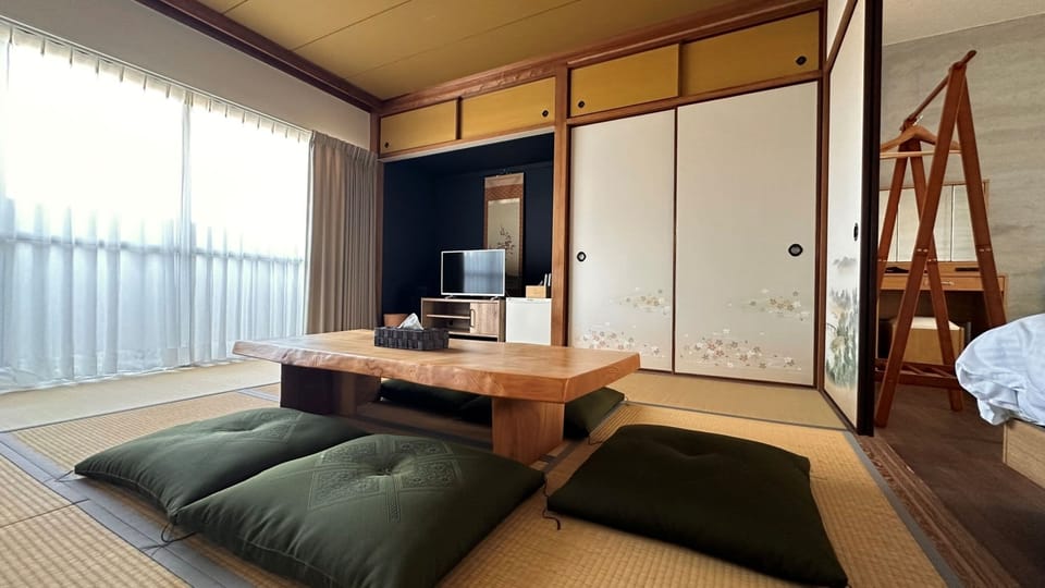 Family Room, Non Smoking (With bathroom, shared toilet) | WiFi (free), bed sheets