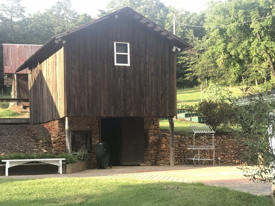 Grain cottage above the rock wine cellar 