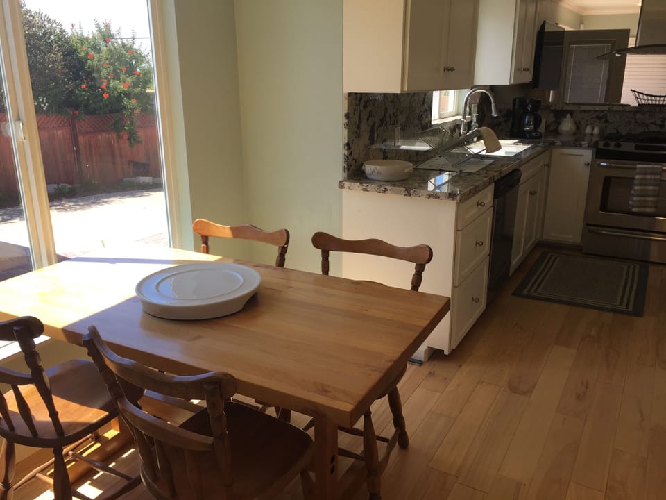 Dining area with large window to private back yard.