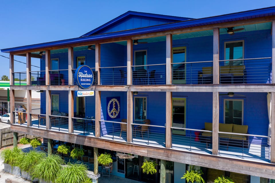 The private balcony of each apartment is large enough to accommodate a full-sized couch, table and chairs, with plenty of open space in-between and fun outdoor décor.