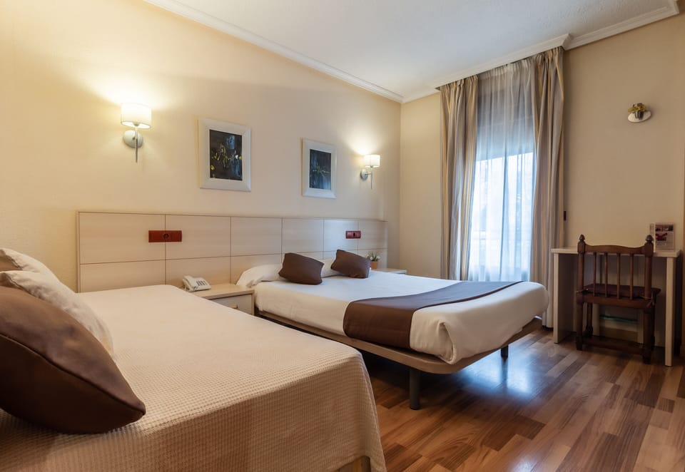 Desk, free WiFi, bed sheets