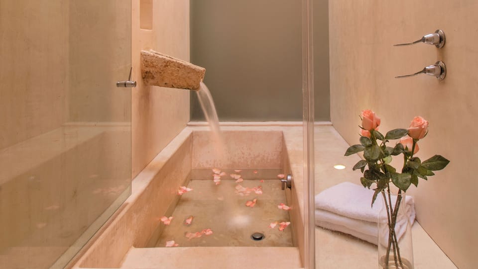 Deluxe Room, 1 King Bed | Bathroom | Separate tub and shower, deep soaking tub, rainfall showerhead
