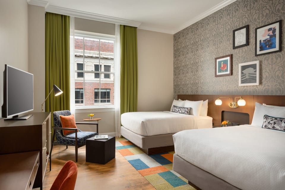 Premium bedding, pillowtop beds, desk, laptop workspace