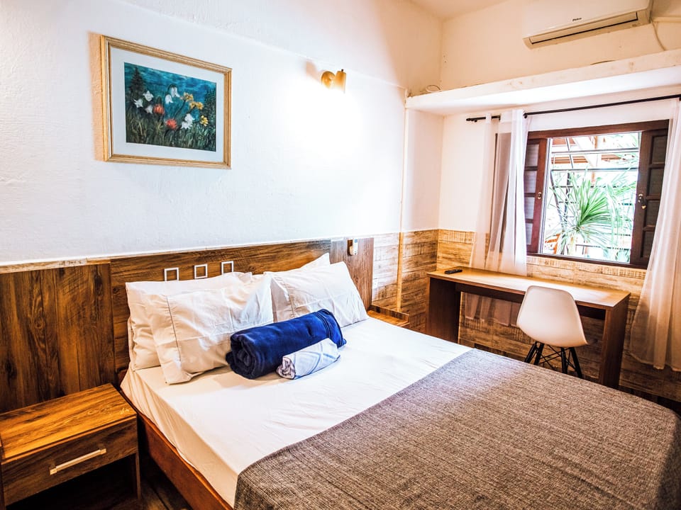 Comfort Room | Minibar, individually furnished, blackout drapes, free WiFi