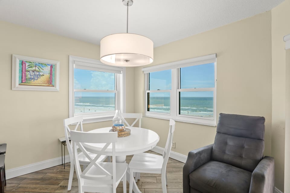 Living/Dining Area with Two Balcony Doors plus Windows Offering Expansive Views!