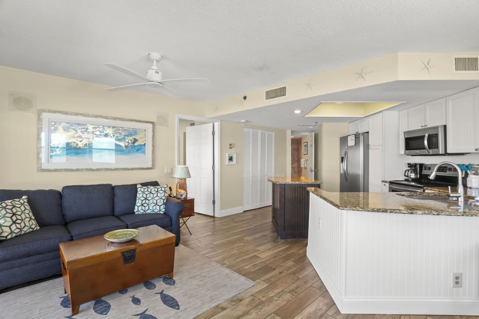 Living/Dining Area with Two Balcony Doors plus Windows Offering Expansive Views!