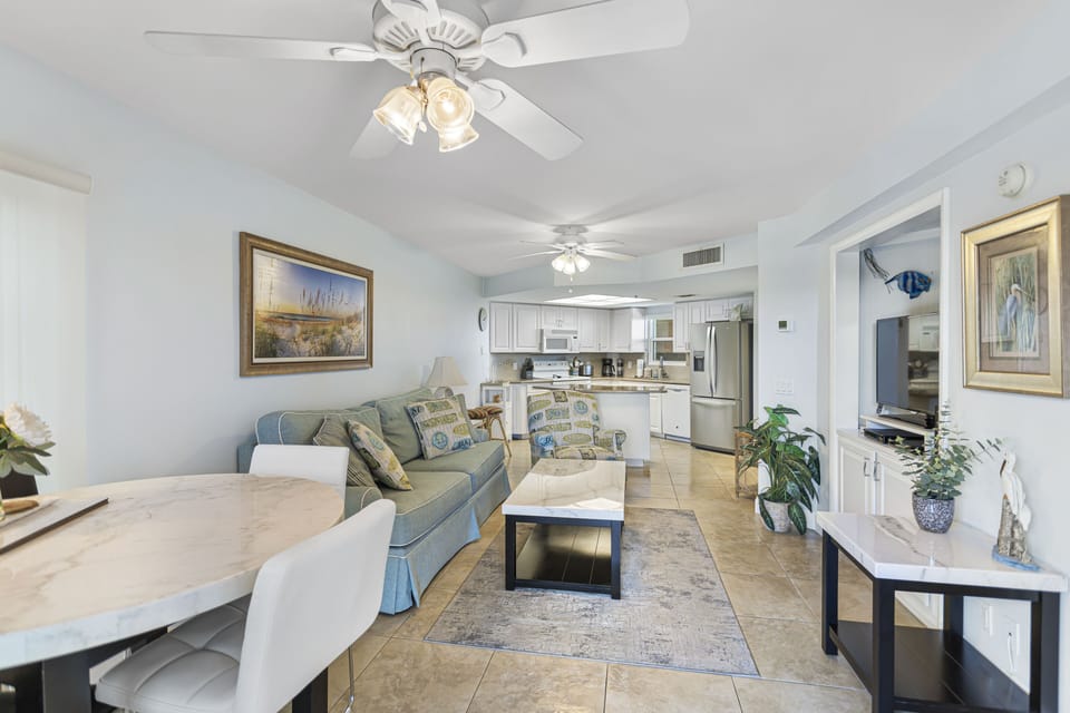 Updated Living Room with Sleeper Sofa and Balcony Access