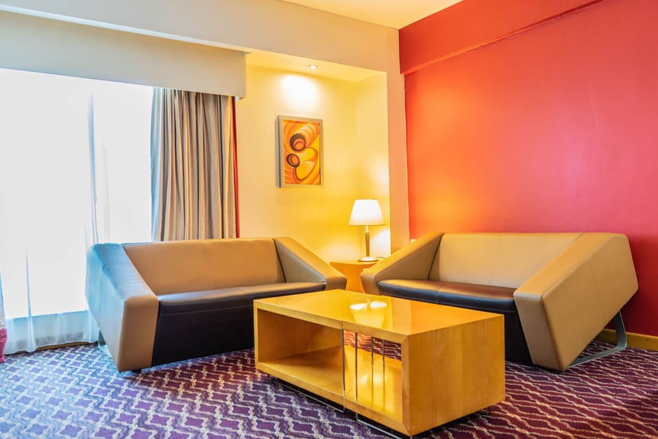 Premium bedding, down comforters, minibar, in-room safe