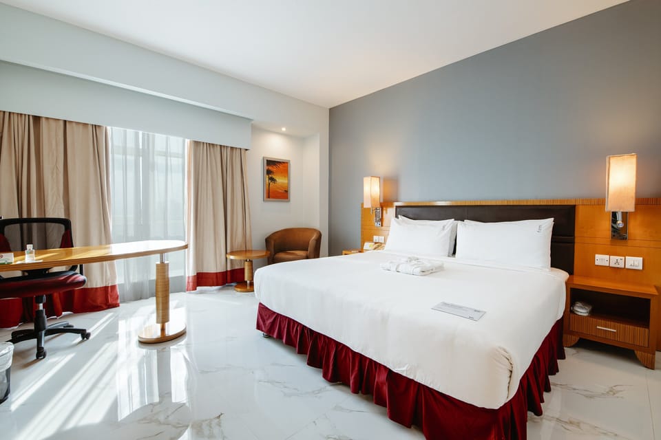 Premium bedding, down comforters, minibar, in-room safe