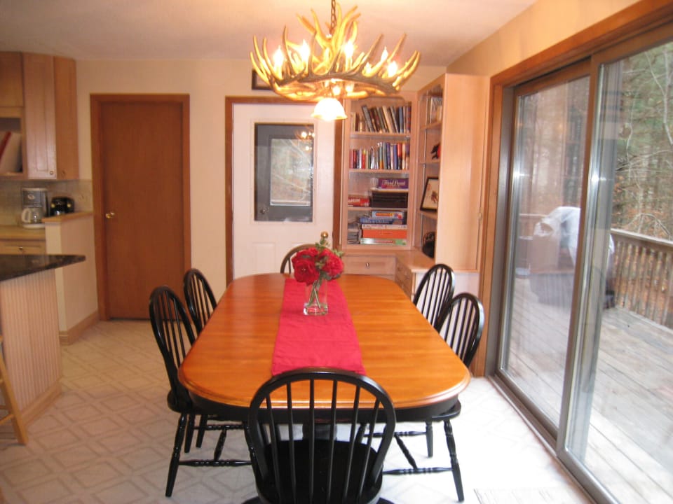 Dining Room:  Feast under the deer antler chandelier