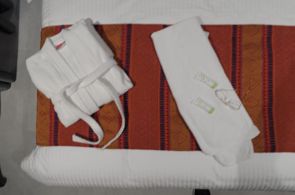 Shower, free toiletries, bathrobes, slippers