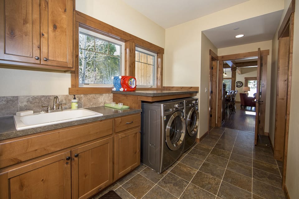 Laundry Room has a washer and dryer with Quick Wash and Quick Dry settings.