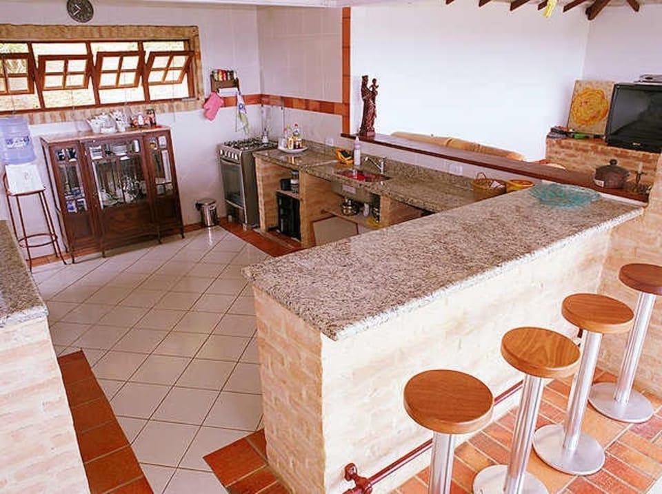 House, 3 Bedrooms | Private kitchen | Full-size fridge, microwave, oven, electric kettle
