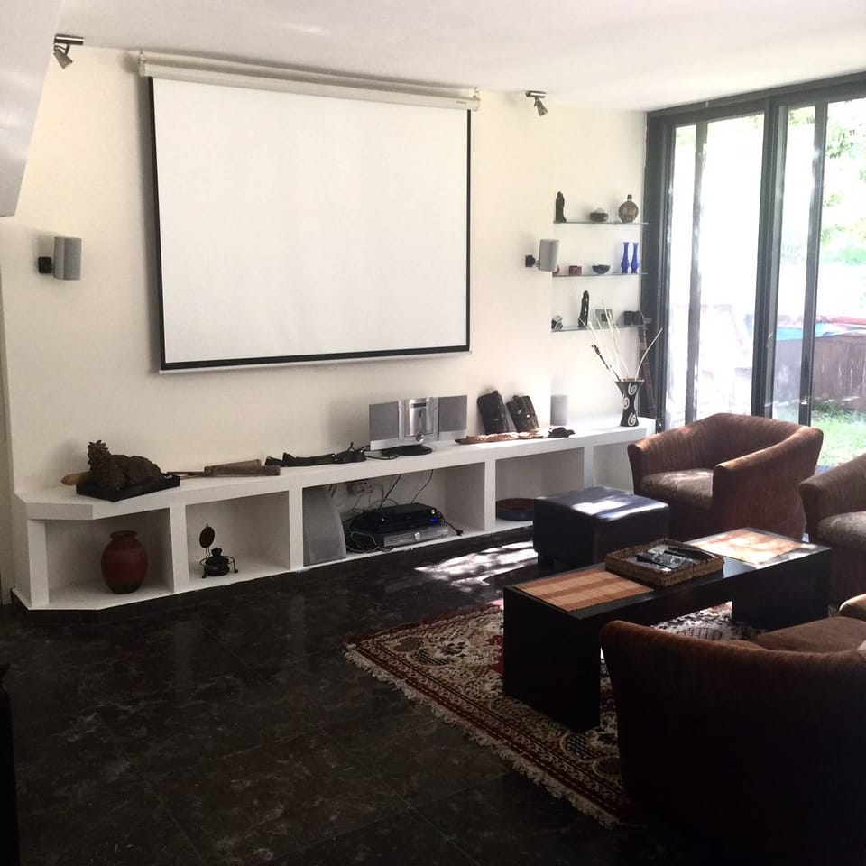 Deluxe Villa, Multiple Beds, Non Smoking | Living area | Flat-screen TV, fireplace
