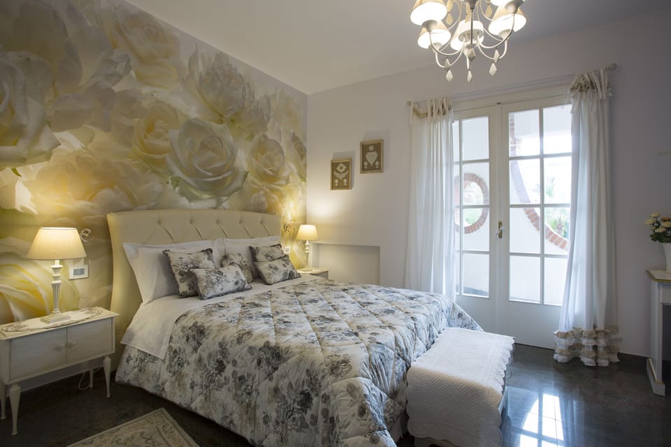 Luxury Triple Room, Patio, Pool View | Premium bedding, down comforters, minibar, in-room safe