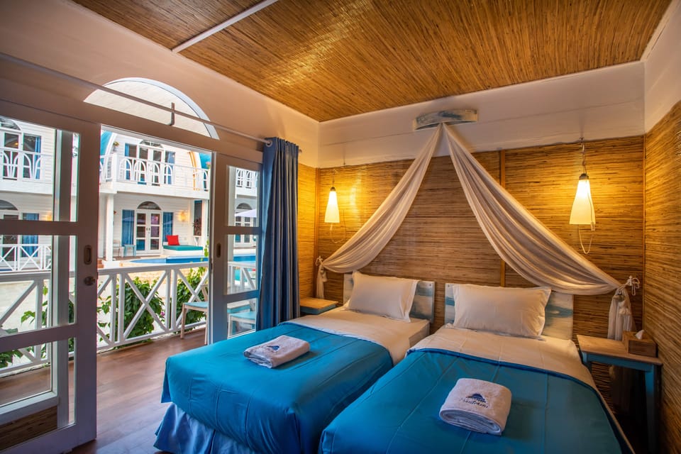 Deluxe Double Room, Pool Access | In-room safe, desk, soundproofing, WiFi (free)