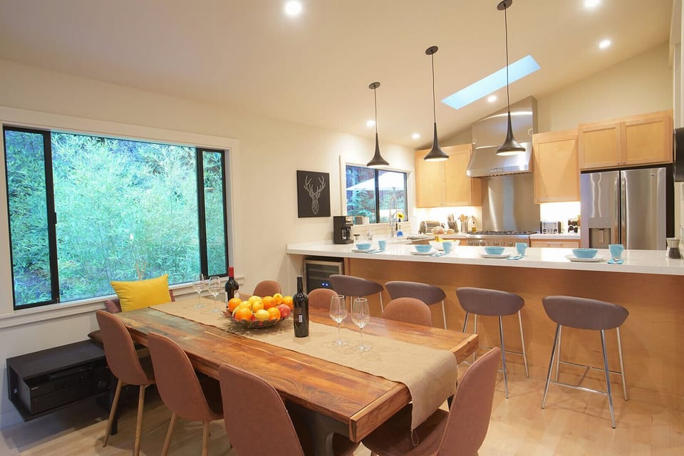 Open floorplan - kitchen, dining, and living areas.