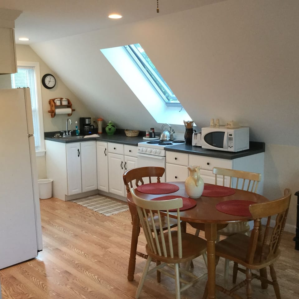 View of dining area & kitchen.