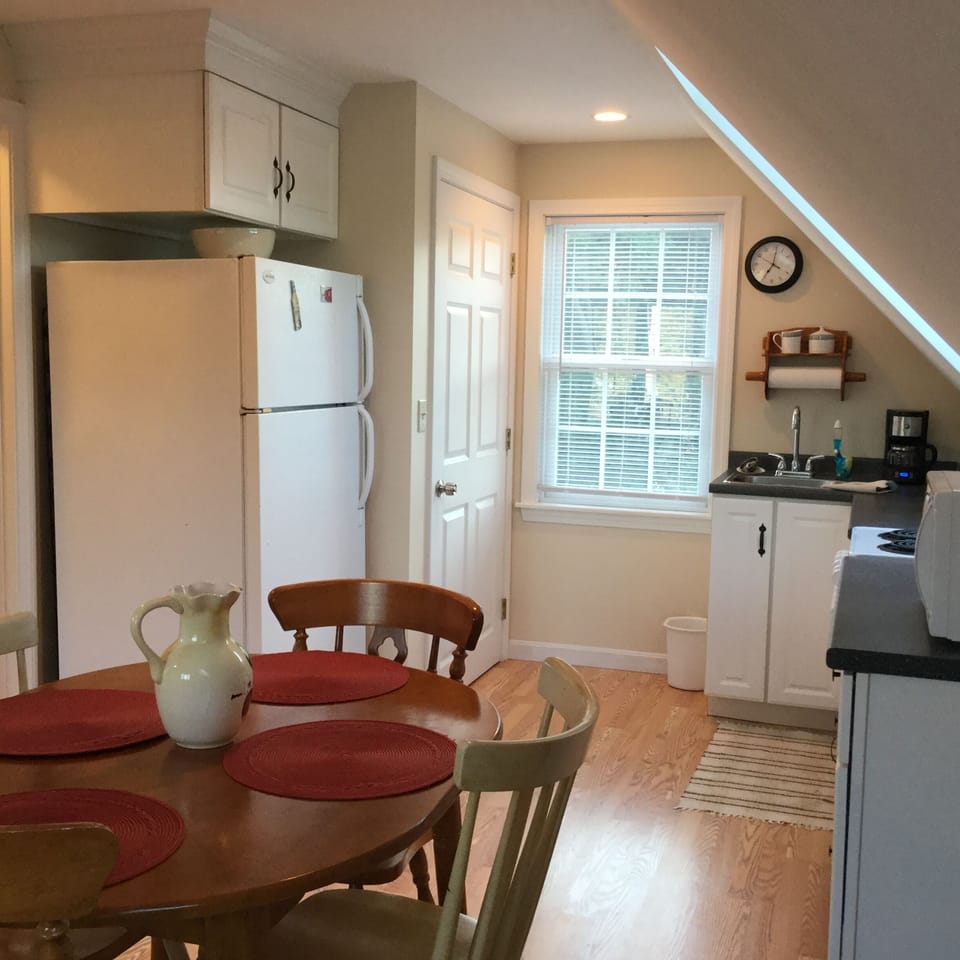 Door to apartment & kitchen area.