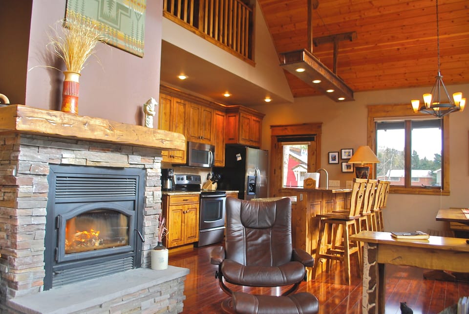 Main floor living room, looking into kitchen