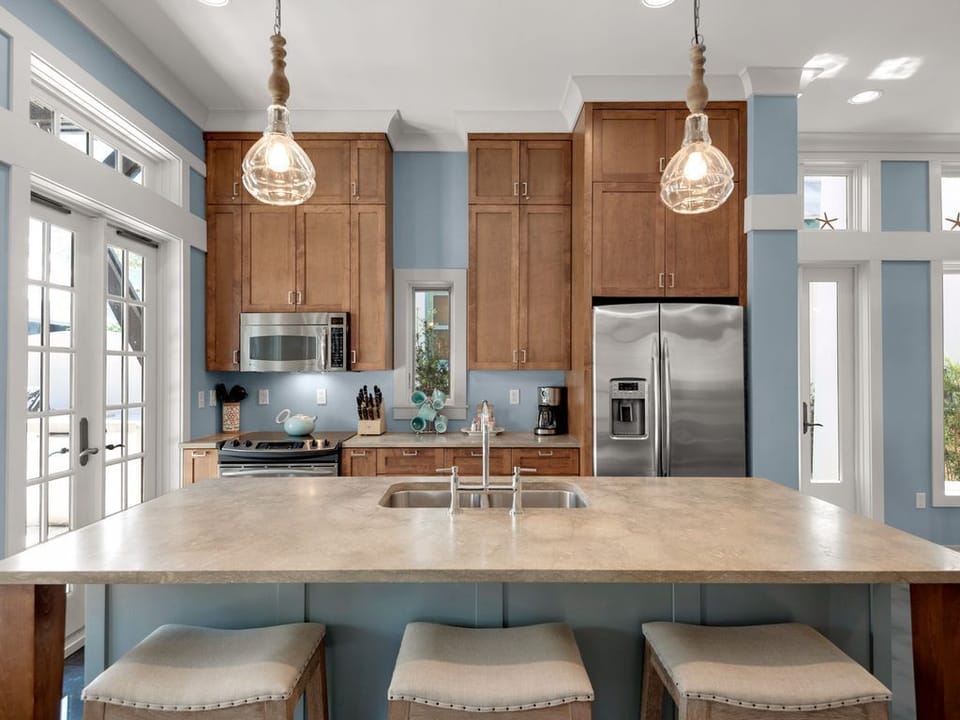 Kitchen Opens to Dining and Outside Patio