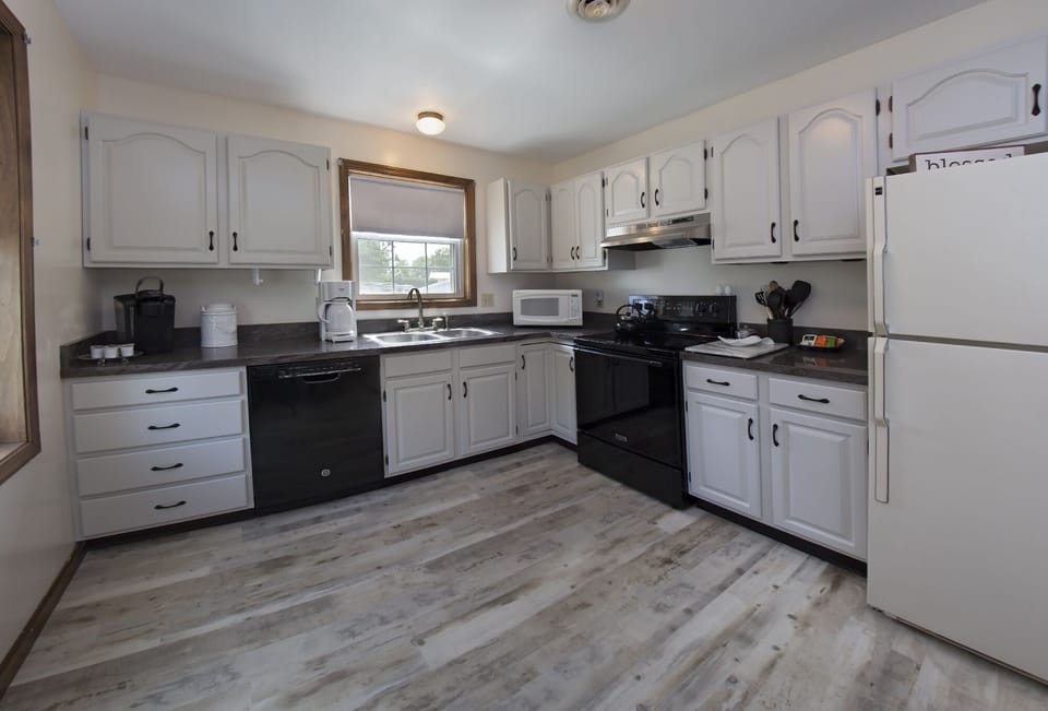 kitchen with dishwasher, microwave, Keurig, and a full cookie jar - yum!