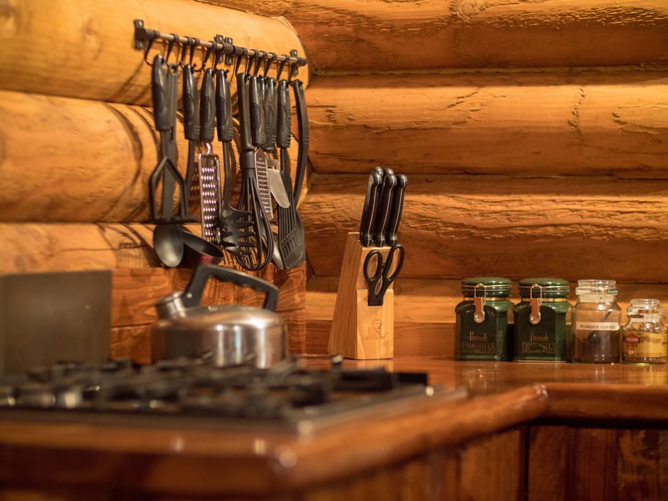 The kitchen is well provisioned with utensils