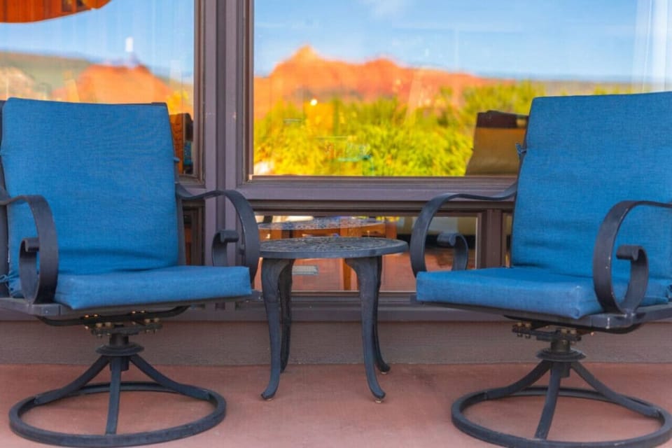 Private patio surrounded by trees, tucked in nature. Wake up and start your day in peace!