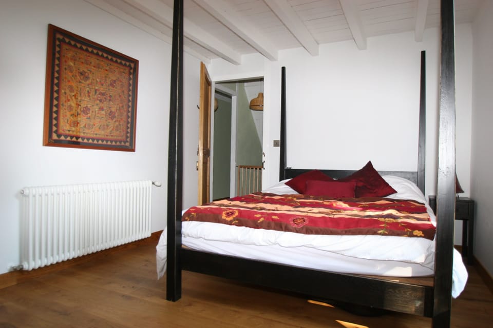 Master bedroom with 4 poster and master dressing room and bath/ shower room.