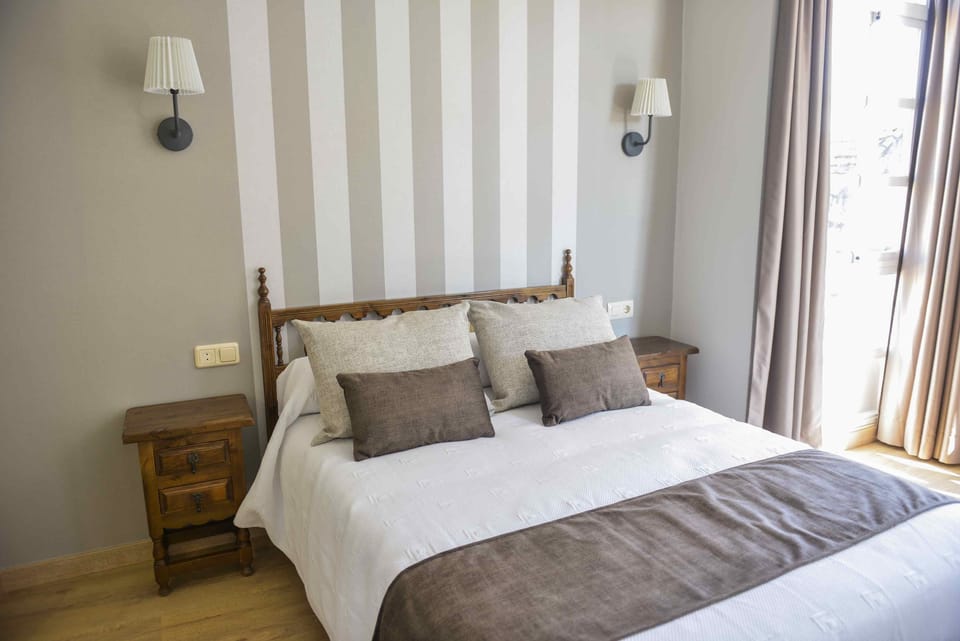 Double or Twin Room | Desk, blackout drapes, free cribs/infant beds, free WiFi