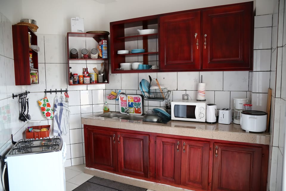 Comfort Double Room (Le Point Depart) | Private kitchen | Fridge, microwave, oven, stovetop