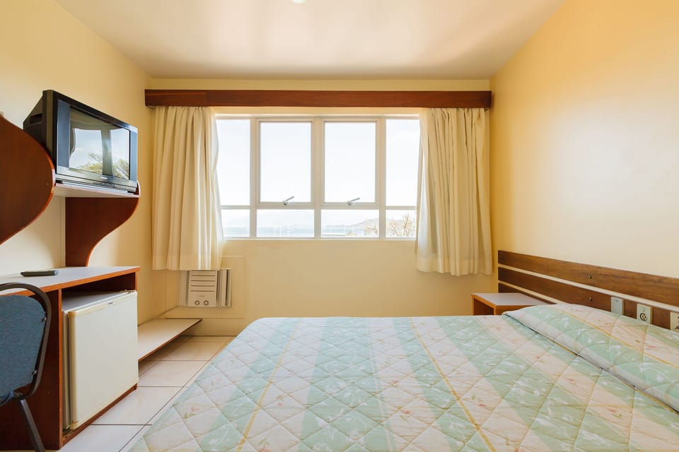 Minibar, desk, laptop workspace, iron/ironing board