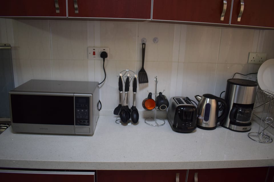 Basic Double Room Single Use, 3 Bedrooms | Private kitchenette | Full-size fridge, microwave, stovetop, coffee/tea maker