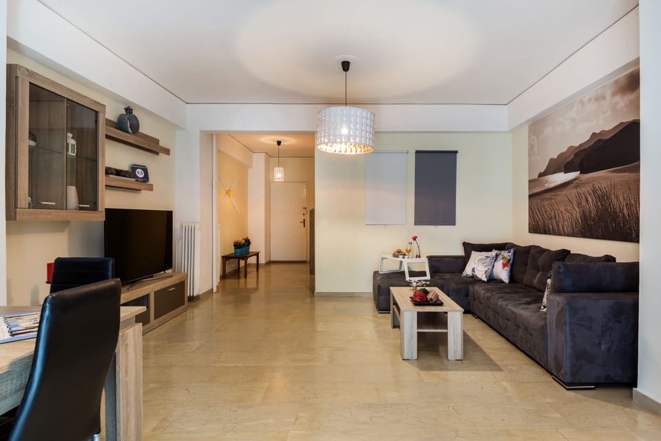 Family Apartment, 2 Bedrooms | Living room | 42-inch flat-screen TV with satellite channels, TV, Netflix