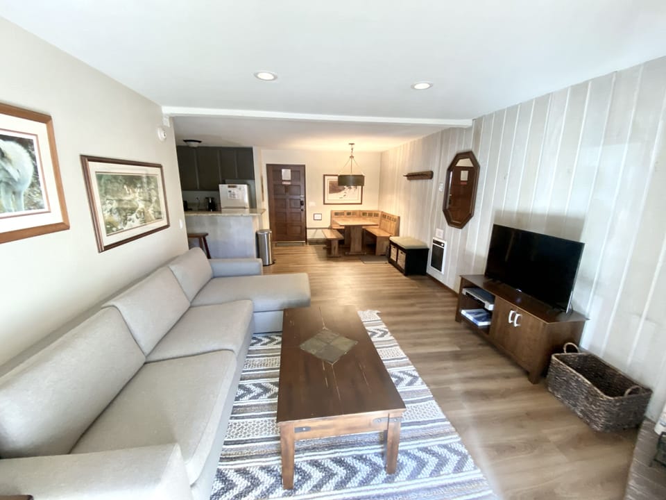 Living space with new luxury sofa, view or dining nook & kitchen 