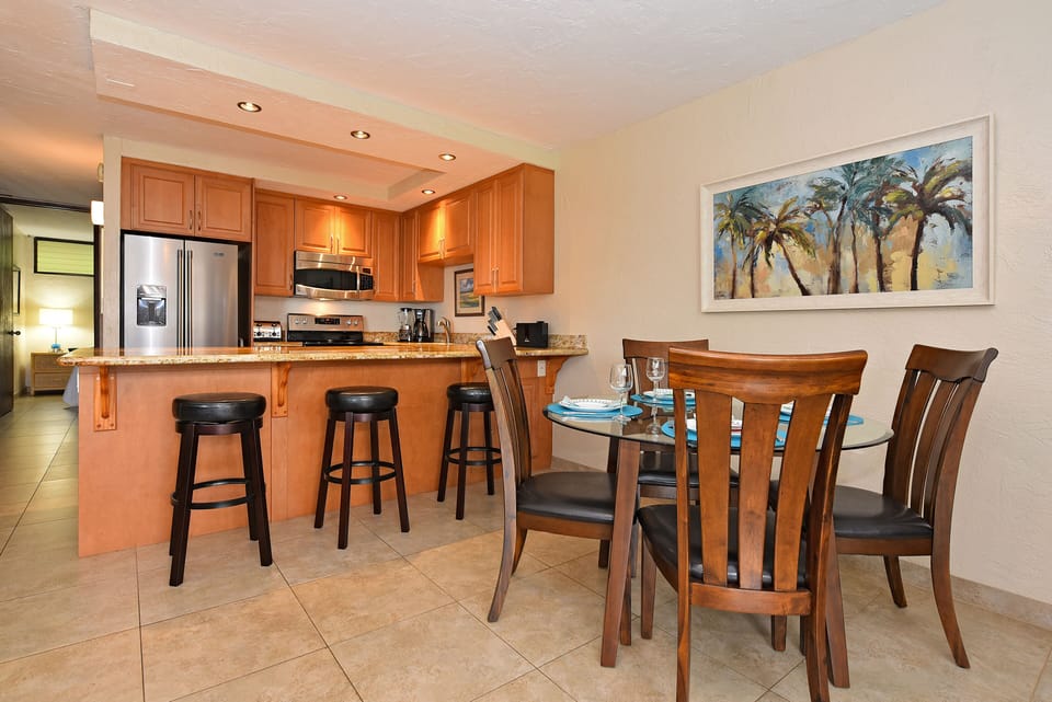 Spacious dining at dinette or at oversize granite top counter